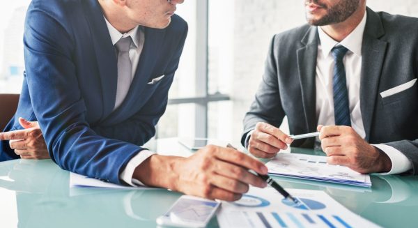 Business Colleagues Meeting Paperwork Concept